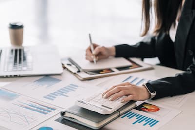 close-up-of-businesswoman-hand-doing-calculation-u-2025-03-05-03-52-48-utc (1).jpg
